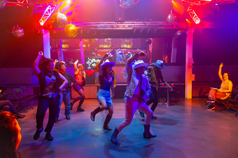Group dancing in a nightclub scene during As You Like It with 3 Witches Shakespeare in Louisville Kentucky